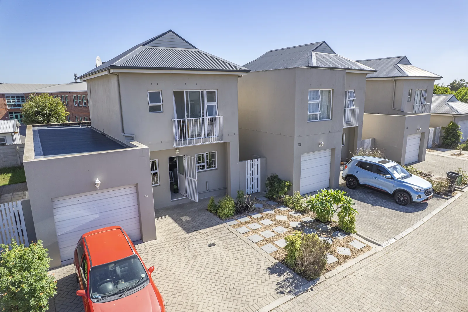 Neat and modern 3 bedroom family home for sale in a secure 24H manned security complex